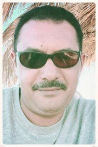 الدكتور احمد العطار